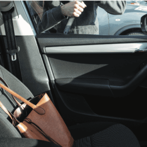 Person breaking into a car
