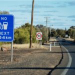 Highway with a fuel and speed sign